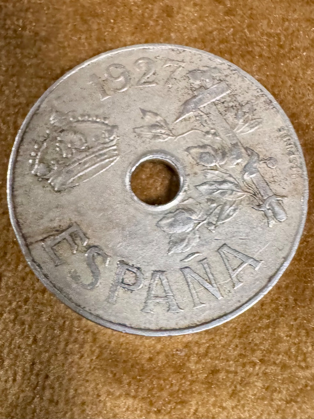 Moneda de 25 céntimos España 1927 con agujero central